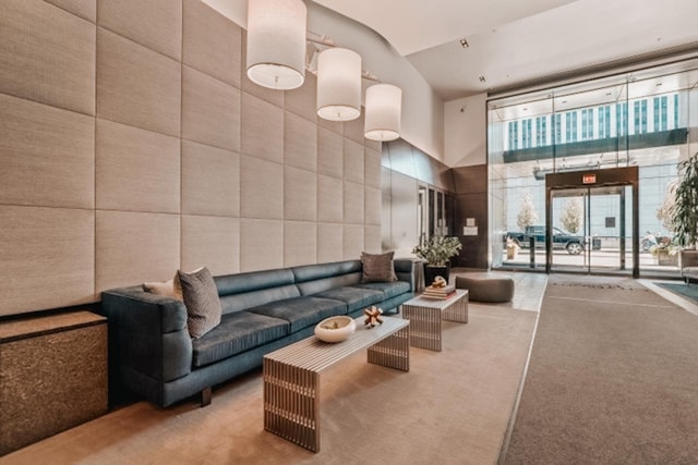 lobby featuring high vaulted ceiling