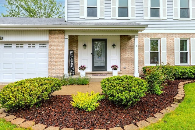 1836 71st St, Woodridge, IL 60517 - view of exterior entry with brick siding and an attached garage