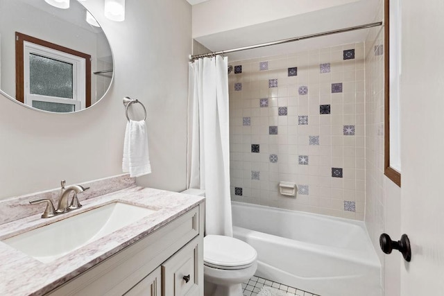 1836 71st St, Woodridge, IL 60517 - bathroom featuring vanity, shower / tub combo, toilet, and tile patterned floors