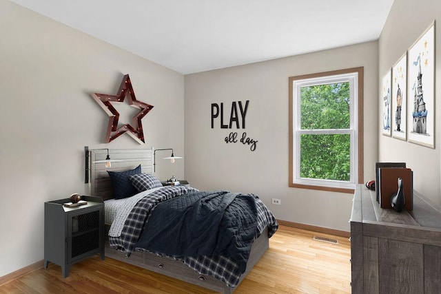 1836 71st St, Woodridge, IL 60517 - bedroom featuring wood finished floors and baseboards