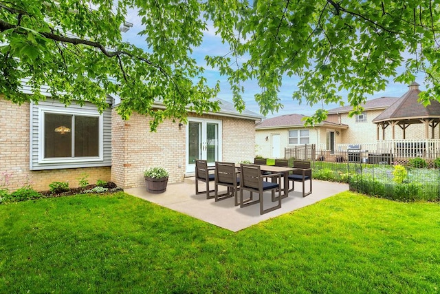 1836 71st St, Woodridge, IL 60517 - back of property with a gazebo, a patio area, and brick siding