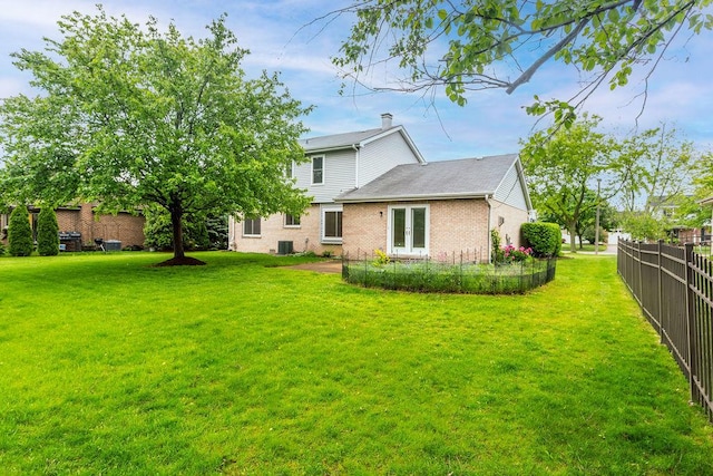 1836 71st St, Woodridge, IL 60517 - rear view of property with brick siding, french doors, and central air condition unit
