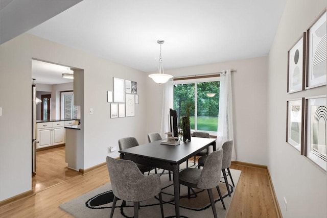 1836 71st St, Woodridge, IL 60517 - dining room featuring light wood finished floors and baseboards