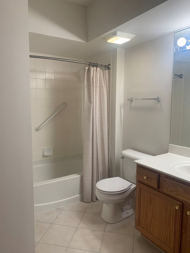 1327 E Washington St Unit 207, Des Plaines, IL 60016 - bathroom with tile patterned floors, toilet, vanity, and shower / tub combo with curtain