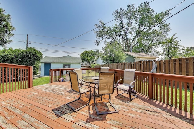 7657 N Osceola Ave, Niles, IL 60714 - deck featuring outdoor dining space and an outdoor structure