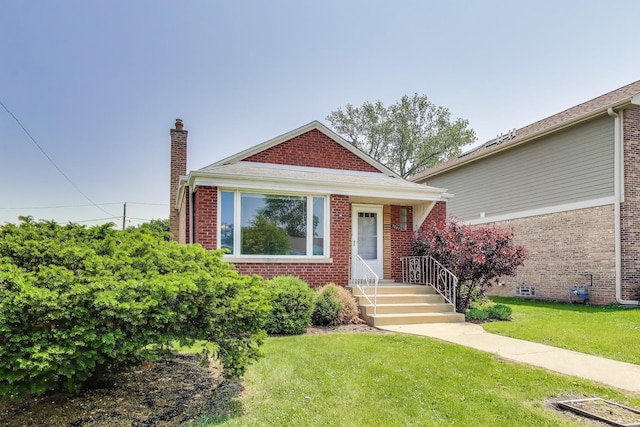 7657 N Osceola Ave, Niles, IL 60714 - bungalow featuring a chimney, brick siding, and a front lawn