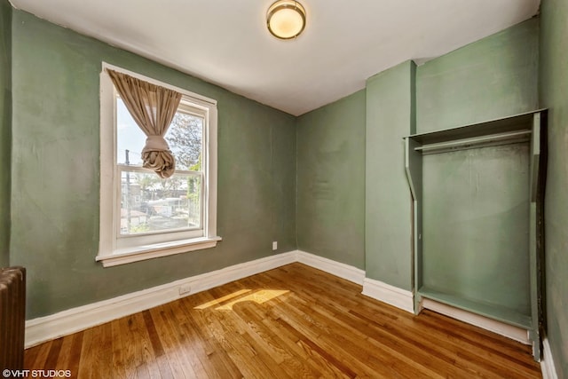 4747 W Monroe St, Chicago, IL 60644 - unfurnished bedroom with hardwood / wood-style floors and baseboards