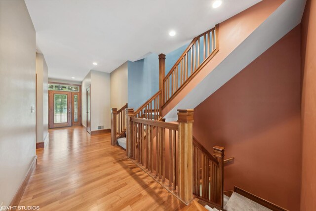 250 Whitney Rd, Lake Zurich, IL 60047 - foyer featuring wood finished floors, stairway, baseboards, and recessed lighting