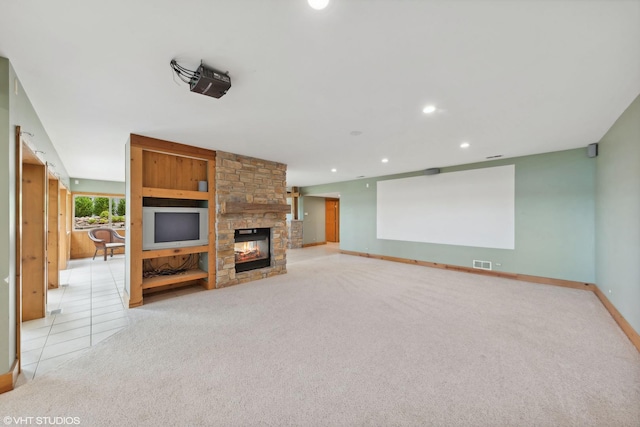 250 Whitney Rd, Lake Zurich, IL 60047 - unfurnished living room featuring baseboards, light carpet, a stone fireplace, and recessed lighting