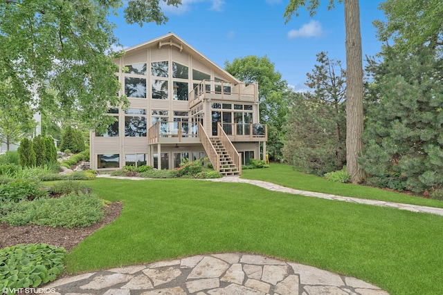 250 Whitney Rd, Lake Zurich, IL 60047 - rear view of property with stairs, a sunroom, a deck, and a lawn