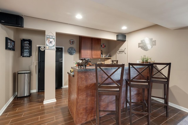 1303 Secretariat Dr, Genoa, IL 60135 - indoor bar featuring baseboards, recessed lighting, and dark wood-style floors