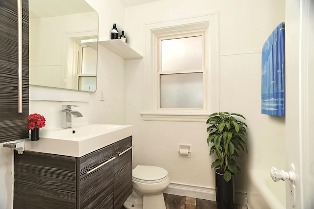 6048 N Rockwell Ave Unit 2, Chicago, IL 60659 - full bath with vanity, wood finished floors, and washtub / shower combination