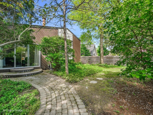 view of yard featuring fence