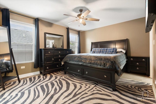 1308 Burry St, Joliet, IL 60435 - bedroom featuring baseboards and ceiling fan