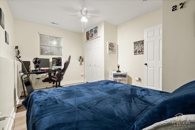 1308 Burry St, Joliet, IL 60435 - bedroom featuring wood finished floors, ceiling fan, and baseboards