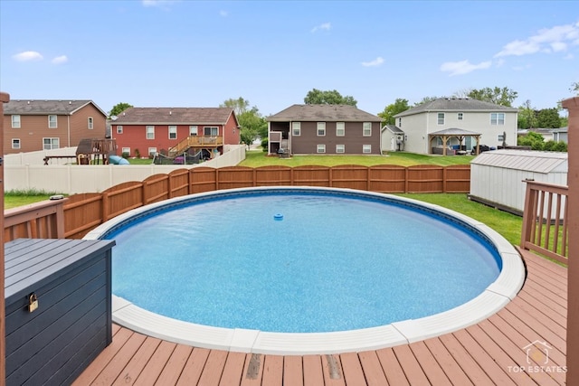 1308 Burry St, Joliet, IL 60435 - view of swimming pool featuring a residential view and a deck