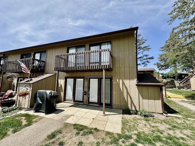 35 Montego Colony Unit 1, Fox Lake, IL 60020 - back of property featuring a balcony and a patio area