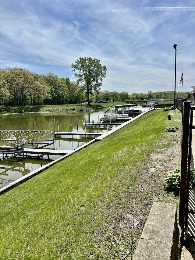 35 Montego Colony Unit 1, Fox Lake, IL 60020 - dock area with a water view, boat lift, and a yard