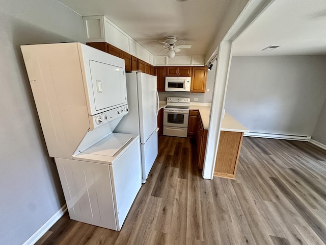 35 Montego Colony Unit 1, Fox Lake, IL 60020 - kitchen featuring white appliances, ceiling fan, dark wood-type flooring, light countertops, and baseboards