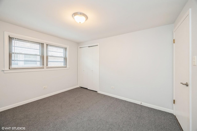 5747 S Kenton Ave Unit 3S, Chicago, IL 60629 - unfurnished bedroom featuring carpet, baseboards, and a closet