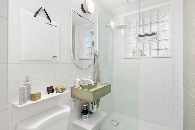 2021 N Leavitt St Unit G, Chicago, IL 60647 - bathroom featuring tile walls, walk in shower, and toilet