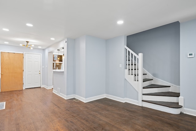 715 E 105th Pl, Chicago, IL 60628 - unfurnished living room with wood finished floors, stairs, recessed lighting, and baseboards