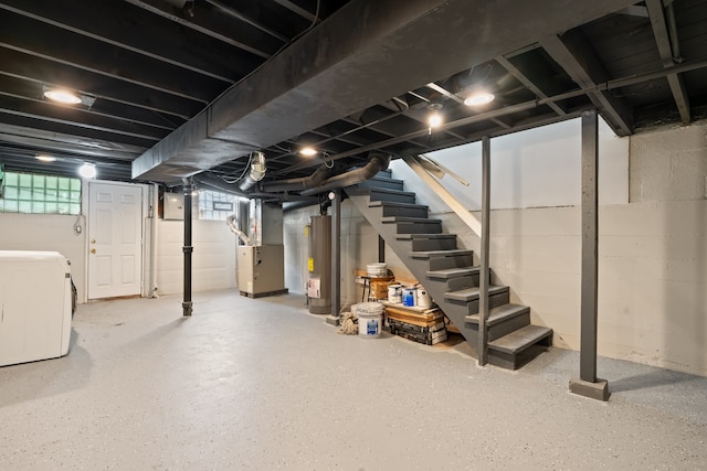 715 E 105th Pl, Chicago, IL 60628 - basement featuring gas water heater, stairway, and washer / dryer