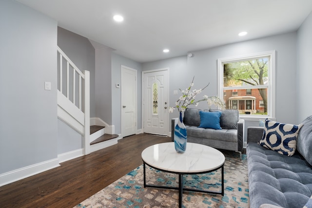 715 E 105th Pl, Chicago, IL 60628 - living room featuring stairs, wood finished floors, recessed lighting, and baseboards