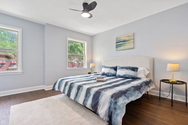 715 E 105th Pl, Chicago, IL 60628 - bedroom with baseboards, wood finished floors, and ceiling fan
