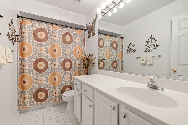 9051 Mansfield Dr, Tinley Park, IL 60487 - full bathroom featuring vanity, toilet, tile patterned floors, and a shower with curtain