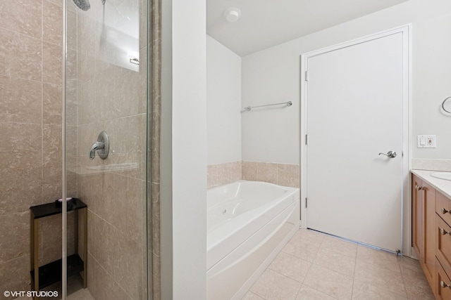 250 E Pearson St Unit 1306, Chicago, IL 60611 - bathroom featuring a shower stall, tile patterned floors, and vanity