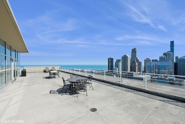 250 E Pearson St Unit 1306, Chicago, IL 60611 - view of patio / terrace featuring a water view, a view of skyline, and a balcony