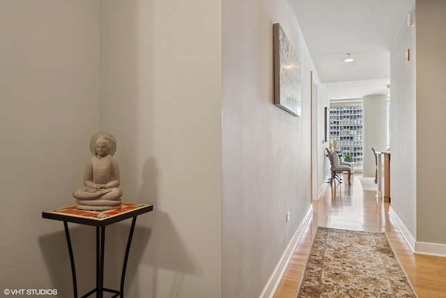 250 E Pearson St Unit 1306, Chicago, IL 60611 - corridor with light wood-style floors and baseboards