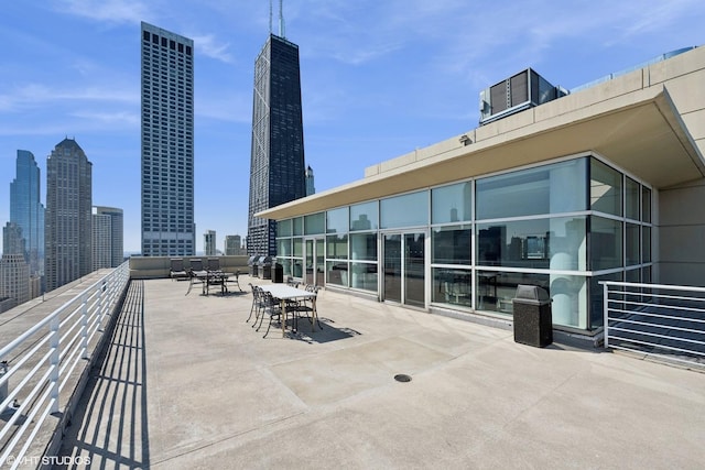 250 E Pearson St Unit 1306, Chicago, IL 60611 - view of patio featuring a view of skyline