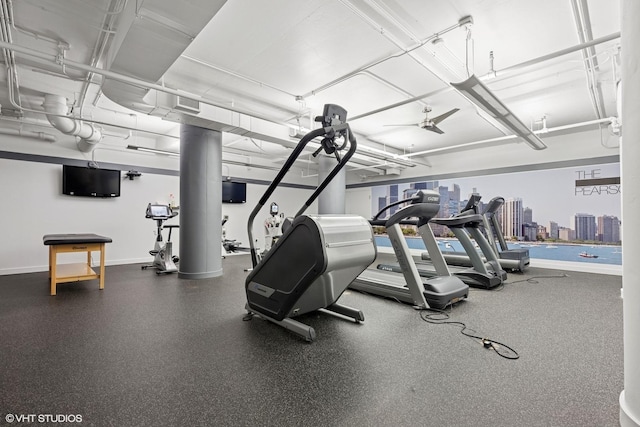 250 E Pearson St Unit 1306, Chicago, IL 60611 - exercise room featuring baseboards and ceiling fan
