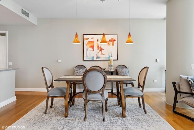 250 E Pearson St Unit 1306, Chicago, IL 60611 - dining space with wood finished floors and baseboards