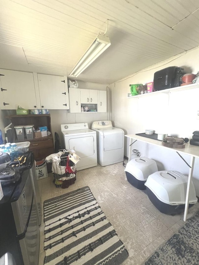 416 W Washington St, Morris, IL 60450 - clothes washing area with washing machine and dryer and cabinet space