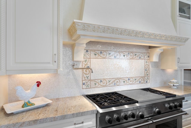 65 E Goethe St Unit 4N, Chicago, IL 60610 - kitchen featuring range with two ovens, tasteful backsplash, white cabinets, and glass insert cabinets