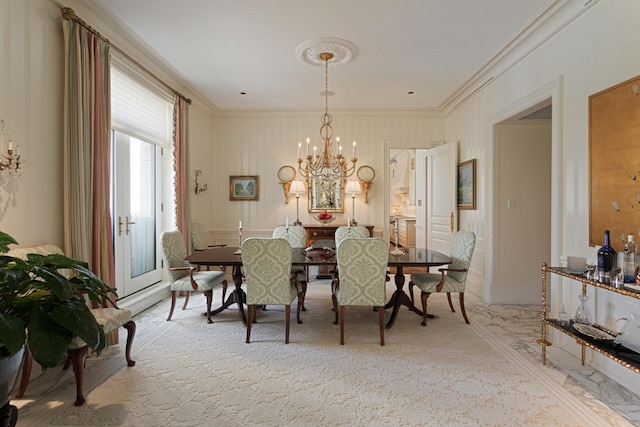65 E Goethe St Unit 4N, Chicago, IL 60610 - dining area with crown molding, a chandelier, and light carpet