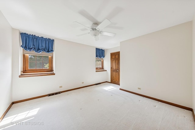 4222 Black Oak Dr, Lisle, IL 60532 - spare room with baseboards, ceiling fan, and light carpet