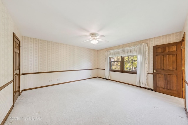 4222 Black Oak Dr, Lisle, IL 60532 - spare room with wallpapered walls, ceiling fan, and carpet
