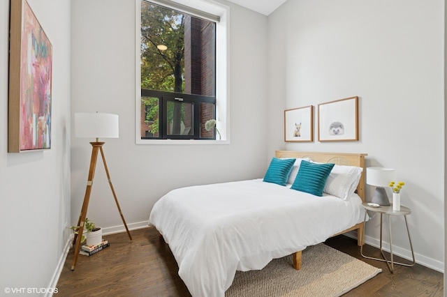 921 N Hoyne Ave Unit 1, Chicago, IL 60622 - bedroom featuring baseboards and wood finished floors