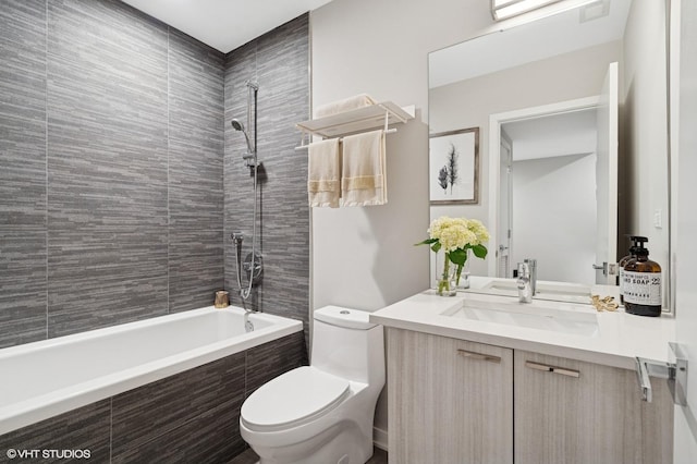921 N Hoyne Ave Unit 1, Chicago, IL 60622 - bathroom with toilet, tiled shower / bath, and vanity
