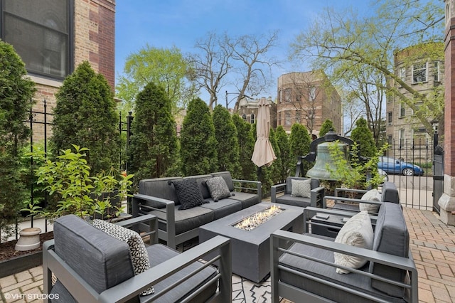 921 N Hoyne Ave Unit 1, Chicago, IL 60622 - view of patio featuring an outdoor living space with a fire pit