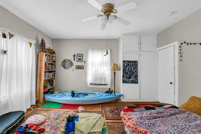 401 S Maple St, Urbana, IL 61801 - bedroom with ceiling fan and wood finished floors