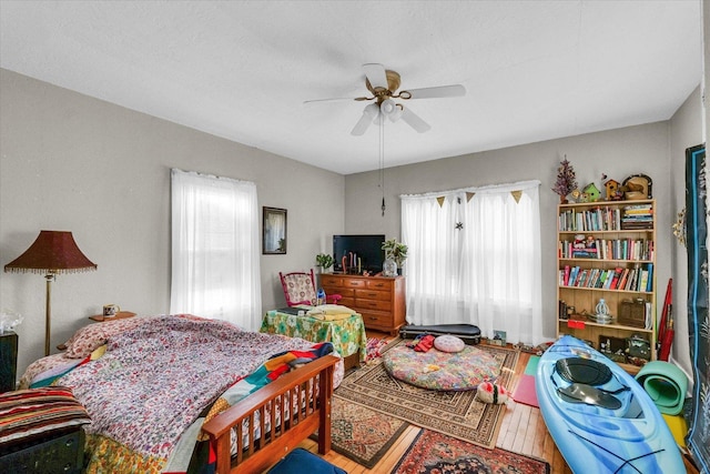 401 S Maple St, Urbana, IL 61801 - bedroom with wood finished floors and ceiling fan