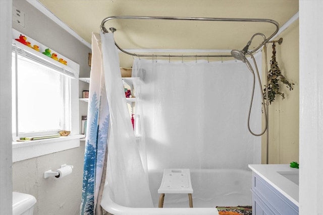 401 S Maple St, Urbana, IL 61801 - bathroom featuring shower / tub combo with curtain, vanity, and toilet