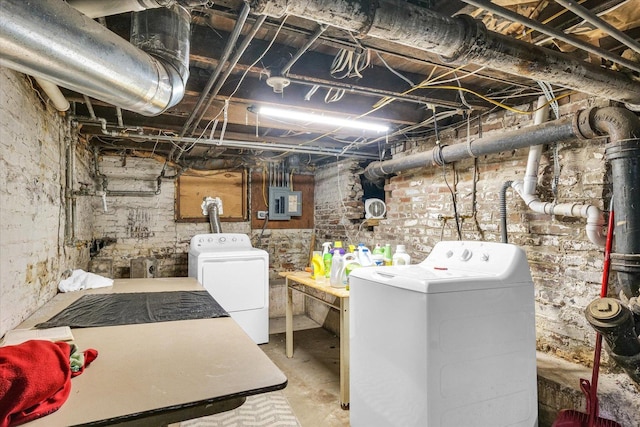 401 S Maple St, Urbana, IL 61801 - unfinished below grade area featuring washer and dryer and electric panel