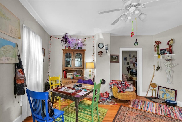 401 S Maple St, Urbana, IL 61801 - dining area featuring wood finished floors, ceiling fan, and baseboards