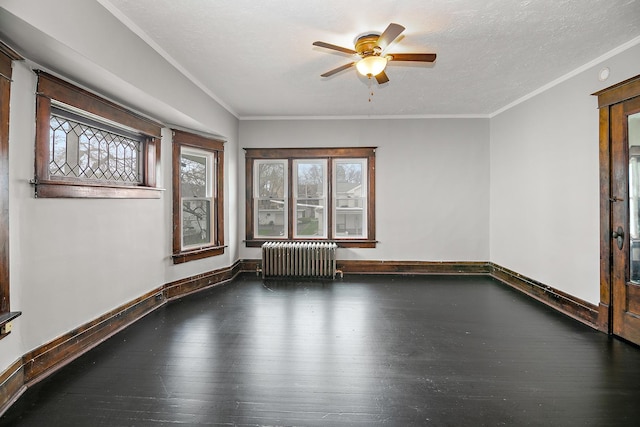 152 S Greenwood Ave, Kankakee, IL 60901 - spare room featuring radiator, ceiling fan, hardwood / wood-style flooring, and ornamental molding
